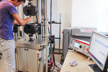 Single-Axis Test Rig featuring Moog Test Controller, performing carbon fiber material tests