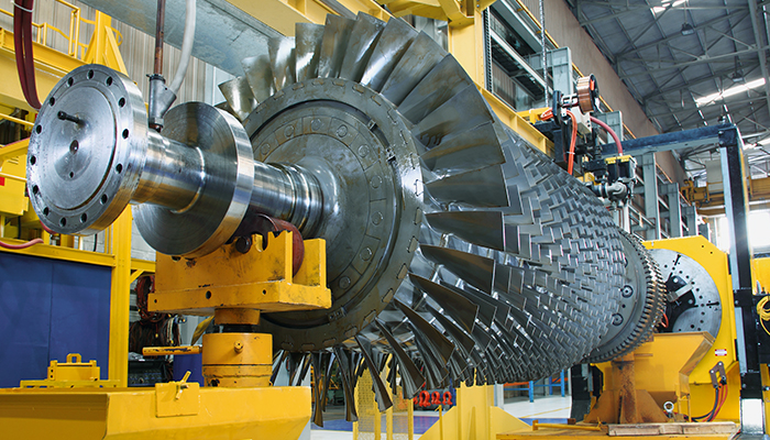 gas turbine rotor being serviced at workshop